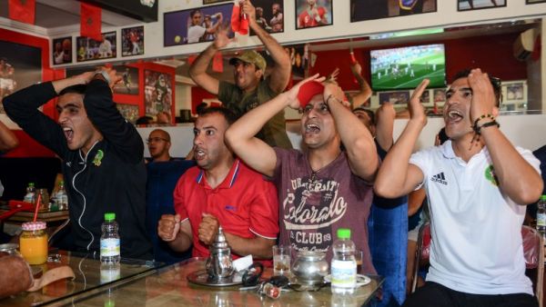 Moroccan football supporters react as they watch their national team play in their Russia 2018 World Cup Group B football match against Portugal at a sports cafe in Marrakech on June 20, 2018.
ABDERRAHMANE MOKHTARI / AFP