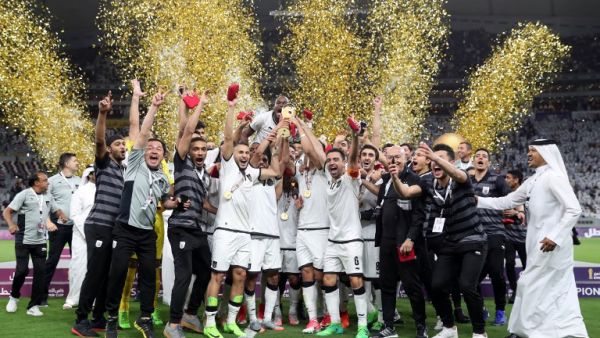 Al-Sadd's players celebrate their victory in the Qatar Emir Cup Final football match against Al-Rayyan at the Khalifa International Stadium in Doha on May 19, 2017. Al-Sadd defeated Al-Rayyan 2-1.
KARIM JAAFAR / AFP