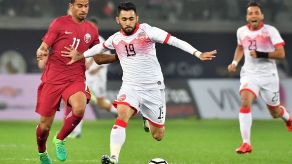 Qatar's Akram Afif (L) vies for the ball with Bahrain's Kamil al-Aswad (R) during the 2017 Gulf Cup of Nations football match between Qatar and Bahrain at the Sheikh Jaber al-Ahmad Stadium in Kuwait City on December 29, 2017.
GIUSEPPE CACACE / AFP Qatar's Akram Afif (L) vies for the ball with Bahrain's Kamil al-Aswad (R) during the 2017 Gulf Cup of Nations football match between Qatar and Bahrain at the Sheikh Jaber al-Ahmad Stadium in Kuwait City on December 29, 2017.
GIUSEPPE CACACE / AFP