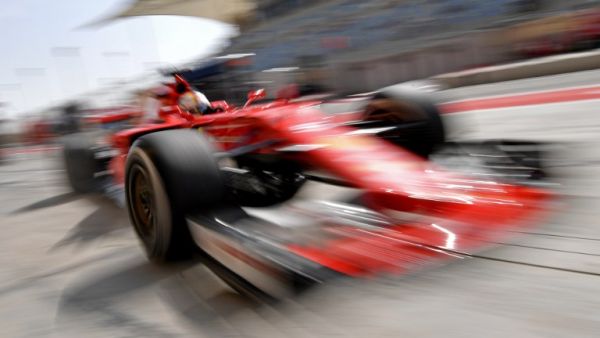 Ferrari's German driver Sebastian Vettel steers back to the pit lane during a practice session ahead of the Formula One Bahrain Grand Prix at the Sakhir circuit in the desert south of the Bahrain's capital, Manama on April 14, 2017.
ANDREJ ISAKOVIC / AFP Ferrari's German driver Sebastian Vettel steers back to the pit lane during a practice session ahead of the Formula One Bahrain Grand Prix at the Sakhir circuit in the desert south of the Bahrain's capital, Manama on April 14, 2017.
ANDREJ ISAKOVIC / AFP