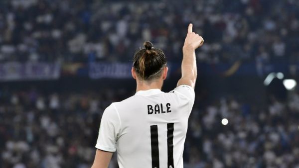 Real Madrid's Welsh forward Gareth Bale celebrates his goal during the semi final football match of the FIFA Club World Cup 2018 tournament between Japan's Kashima Antlers and Spain's Real Madrid at the Zayed Sports City Stadium in Abu Dhabi, the capital of the United Arab Emirates, on December 19, 2018.
Giuseppe CACACE / AFP