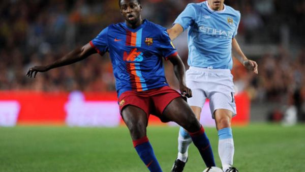 من مواجهة كأس جوان غامبارت بين الفريقين قبل عدة أعوام حينما كان غاريث باري (يمين) في سيتي وتوريه (يسار) في برشلونة