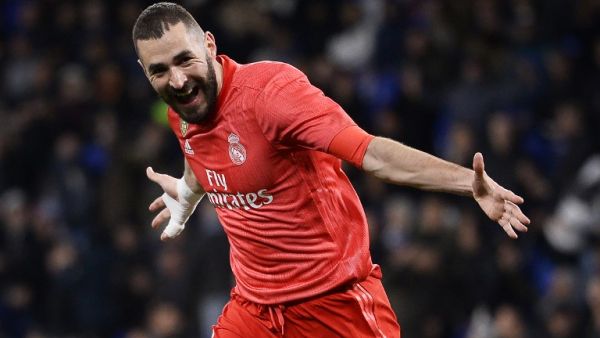 Real Madrid's French forward Karim Benzema celebrates after scoring a goal during the Spanish league football match between RCD Espanyol and Real Madrid CF at the RCDE Stadium in Cornella de Llobregat on January 27, 2019.
Josep LAGO / AFP