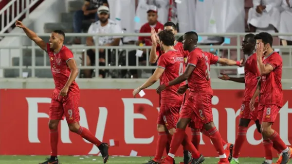 لاعبو الدحيل يحتفلون خلال المباراة