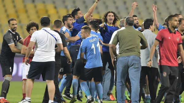 Jordan’s al-Faisaly players celebrate after winning the Arab Club championship semifinal against Egypt’s al-Ahly during the Arab Club championship semifinal match at Borg el-Arab Stadium near Alexandria on August 2, 2017.
MOHAMMED HASSANEEN / AFP