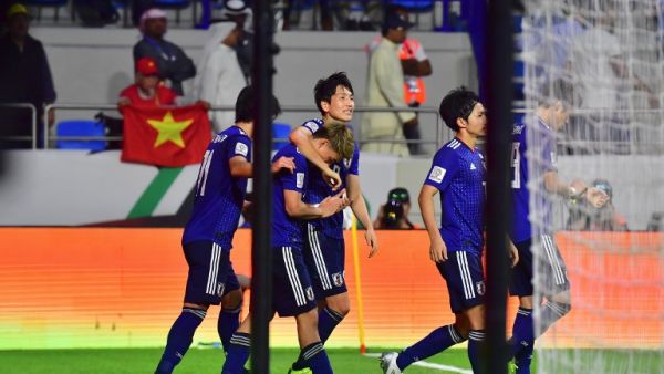 Japan's players celebrate their goal during the 2019 AFC Asian Cup quarter-final football match between Vietnam and Japan at the Al-Maktoum Stadium in Dubai on January 24, 2019.
Giuseppe CACACE / AFP Japan's players celebrate their goal during the 2019 AFC Asian Cup quarter-final football match between Vietnam and Japan at the Al-Maktoum Stadium in Dubai on January 24, 2019.
Giuseppe CACACE / AFP