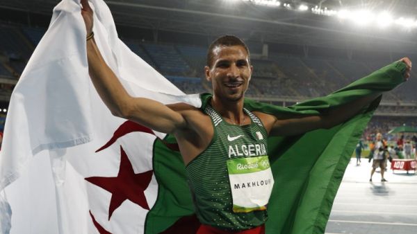 Algeria's Taoufik Makhloufi celebrates after winning second place in the Men's 800m Final during the athletics competition at the Rio 2016 Olympic Games at the Olympic Stadium in Rio de Janeiro on August 15, 2016.
Adrian DENNIS / AFP