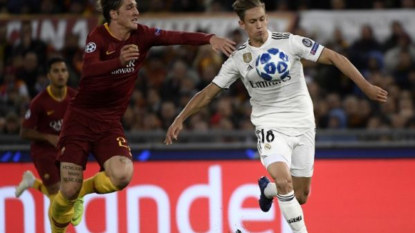 ماركوس يورينتي (يمين) خلال مواجهة ريال مدريد وروما