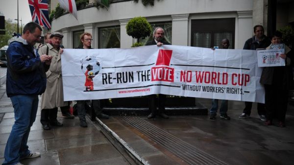 Protesters demonstrate against the perceived exploitation of workers in Qatar, the location of the 2022 World Cup, before a UEFA Congress in central London on May 24, 2013. AFP PHOTO/CARL COURT
CARL COURT / AFP