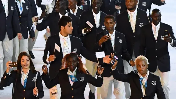 The Refugee Olympic team members take part in the opening ceremony of the Rio 2016 Olympic Games at the Maracana stadium in Rio de Janeiro on August 5, 2016.
FRANCK FIFE / AFP