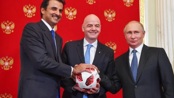 (From L) Emir of Qatar Sheikh Tamim bin Hamad Al-Thani, FIFA President Gianni Infantino and Russian President Vladimir Putin pose for a photography during a symbolic transfer of the authority to Qatar to host the World Cup 2022 at the Kremlin in Moscow on July 15, 2018.
Yuri KADOBNOV / POOL / AFP