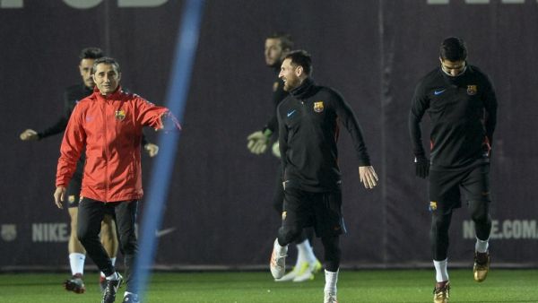 ميسي وفالفيردي خلال تدريبات برشلونة