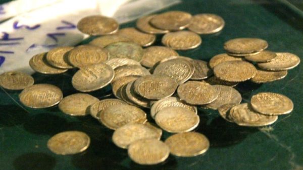 Ancient coins from Syria are being sold on Facebook (AFP/Louai Beshara)