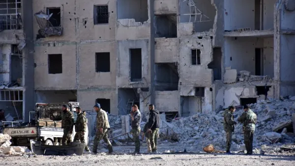 Government forces inspect newly captured district of East Aleppo (George Ourfalian/AFP