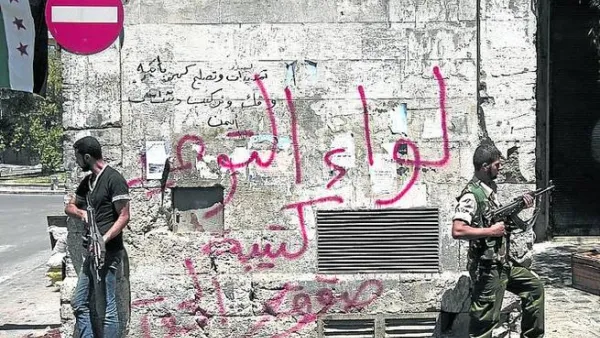 مسلحون من المعارضة في احد احياء حلب/أ.ف.ب