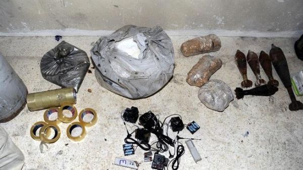 SYRIA, JOBAR : A handout picture released by the Syrian Arab News Agency (SANA) on August 24, 2013 shows bags of what the Syrian government claims to be materials used to make chemical weapons discovered in Jobar on the outskirts of the capital Damascus. AFP PHOTO / HO / SANA" 