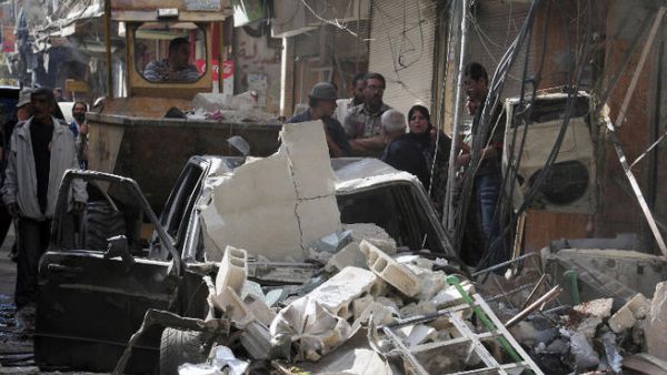 Over 100,000 people have died in Syria since the outbreak of the civil war between President Assad's regime and rebel forces. (Image credit: AFP)