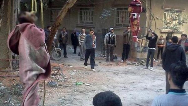 صورة وزعها نشطاء على شبكة توتير للمشنوقين صورة وزعها نشطاء على شبكة توتير للمشنوقين