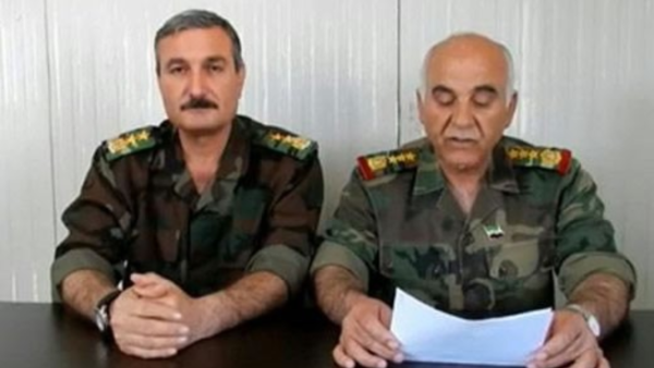 صورة ارشيفية للعميد مصطفى الشيخ والعقيد رياض الاسعد 