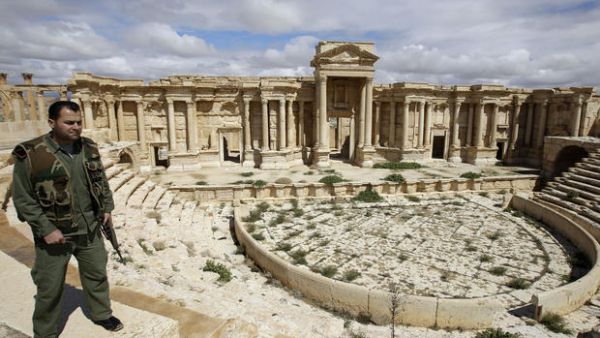 A Syrian policeman patrols the ancient city of Palmyra, 2014.  (AFP/Joseph Eid)