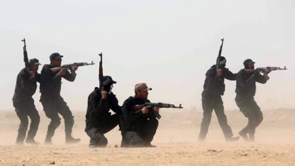 Shiite militiamen train in Iraq.  Iraq's Shiite Popular Mobilization force has been instrumental in combatting Daesh.  (AFP/File)