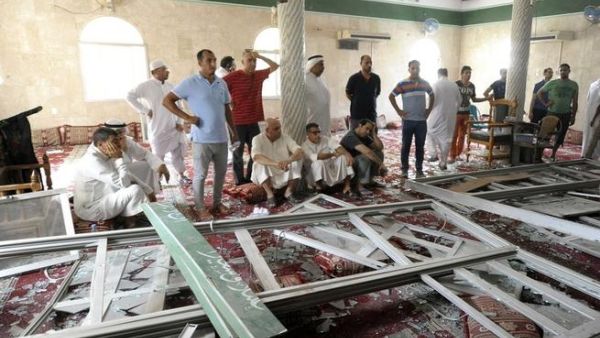 Locals examine the damage to Imam Ali mosque in Qatif, Saudi Arabia following last Friday's suicide bomb attack that left 21 dead.  (AFP/File)