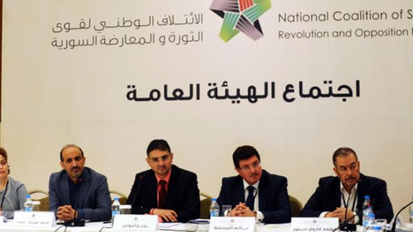 Members of the Syrian National coalition (SNC) attend a meeting of the National Coalition on November 9, 2013, in Istanbul. [AFP]