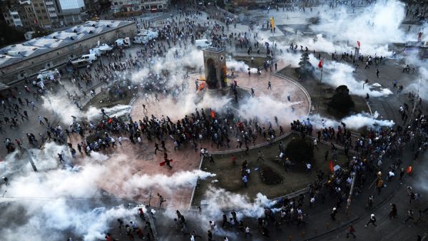 Riot police fire tear gas on demonstrators in Istanbul's Taksim Square, June 11 2013.  (AFP/Bulent Kilic)
