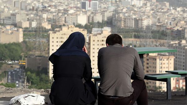 What do average Iranians see in their futures as the nuclear deal gets implemented?  (AFP/Atta Kenare)