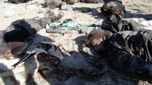 صورة وزعتها وكالة سانا السورية الرسمية قالت انها جثث مقاتلين في المعارضة قتلوا في ريف دمشق/أ.ف.ب