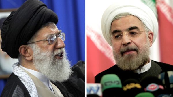 Iran's supreme leader Ayatollah Ali Khamenei and newly elected president, Hassan Rouhani, attending [BEHROUZ MEHRI/AFP]