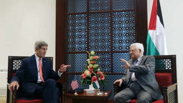 US Secretary of State John Kerry meets with Palestinian authority President Mahmoud Abbas in the West Bank city of Bethlehem on November 6, 2013. [AFP/Fadi Arouri]