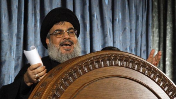 The head of Lebanon's militant Shiite Muslim movement Hezbollah, Hassan Nasrallah speaks during a rare live appearance from Beirut's southern suburb neighbourhood of Rweiss on November 13, 2013. [Getty Images]