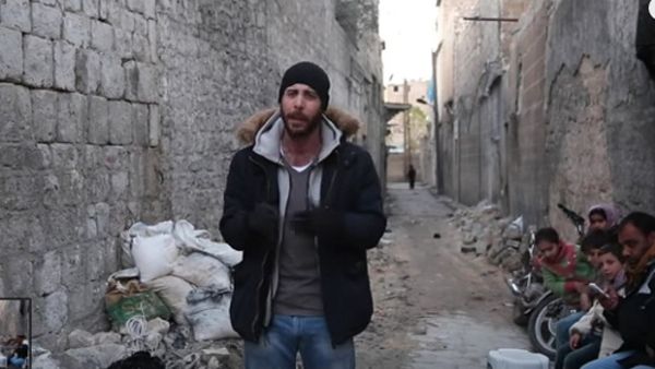 Rami Jarrah reporting from Aleppo after a bombing strike. (AFP/File) 