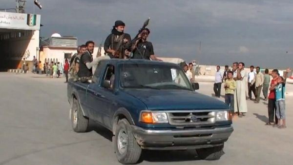 An image grab taken from a video uploaded on YouTube on September 20, 2013 shows alleged Northern Storm brigade members, loyal to the Free Syrian Army. [AFP PHOTO / YOUTUBE]