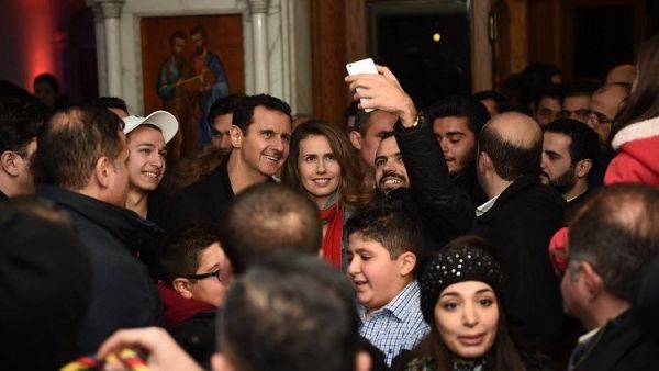 الرئيس السوري بشار الاسد وعقيلته في كنيسة العذراء