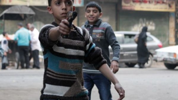 اطفال في اول ايام عيد الاضحى في بستان القصر/حلب/ا.ف.ب