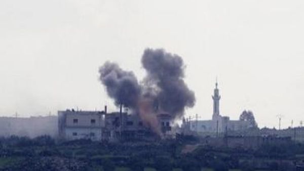 Smoke rises from shell explosions in the Syrian village of al-Jamlah. Photo: [REUTERS/Baz Ratner]