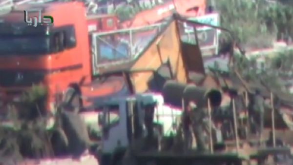 لقطة من فلم وزعه ناشطون يؤكد تورط النظام بقصف الغوطتين