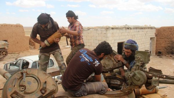 Rebel fighters from the Jaish al-Fatah (or Army of Conquest) brigades load ammunitions into a tank during clashes with Syrian pro-government forces near the village of Om al-Krameel, in Aleppo's southern countryside on May 5, 2016. (AFP/Omar Haj Kadour) Rebel fighters from the Jaish al-Fatah (or Army of Conquest) brigades load ammunitions into a tank during clashes with Syrian pro-government forces near the village of Om al-Krameel, in Aleppo's southern countryside on May 5, 2016. (AFP/Omar Haj Kadour)