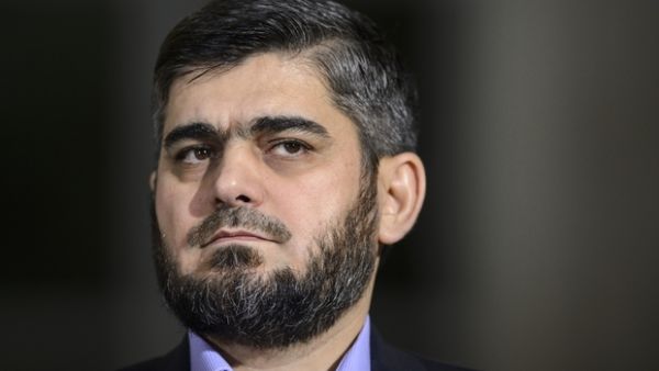 Chief negotiator for the main Syrian opposition umbrella group the High Negotiations Committee (HNC), Jaysh al-Islam's Mohammed Alloush. (AFP/File)