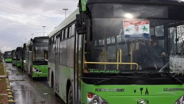 A 22nd convoy carrying civilians and opposition fighters from the city of Douma arrived in Aleppo's Al-Bab district. (AFP/ File Photo)