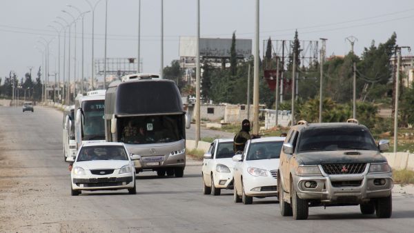 Syrian prisoners arrive in rebel-held Rashidin after their release from government jails, April 21 2017. (AFP/Omar Haj Kadour)