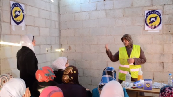 Women in Dara'a province in southern Syria take Civil Defense courses. [Twitter]