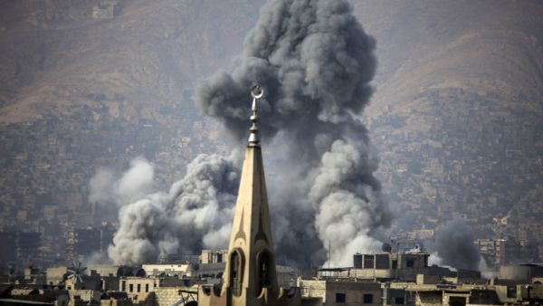 Smoke rises following a reported air strike on the rebel-held besieged town of Arbin, in the Eastern Ghouta region on the outskirts of Damascus, Nov. 23 2017 (Amer Almohibany/AFP)