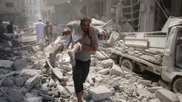 The aftermath of a Syrian government airstrike on a market in Idlib in 2016. (AFP/file)