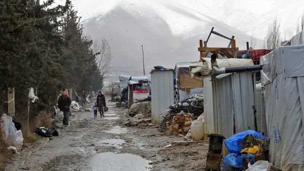 Syrian refugees living in dire conditions in Lebanon. (AFP/Joseph Eid)