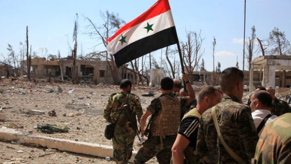 Some of the military positions of the Assad regime were hit by rockets in Syria. (AFP/ File Photo)