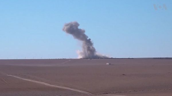 A US airstrike on Raqqa in December 2016. (Wikimedia Commons)