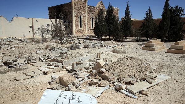 Syrian regime forces raided graveyards looking for valuables. (AFP/ File Photo of destroyed graveyard)